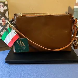Valentina Leather purse with multi zip sections. Brand new with tags